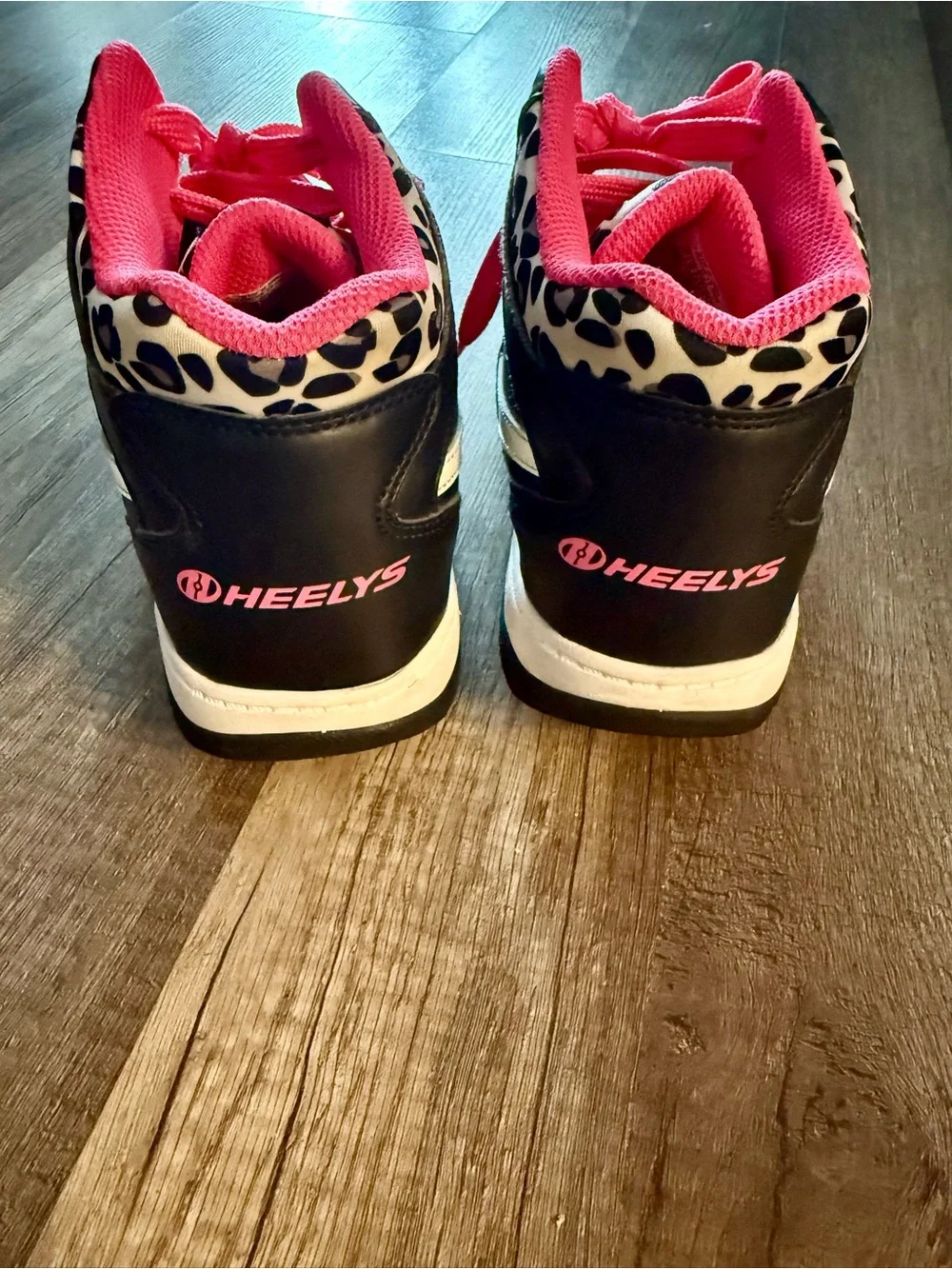 Reebok Black & Hot Pink Mid-Top Heelys with White Accents